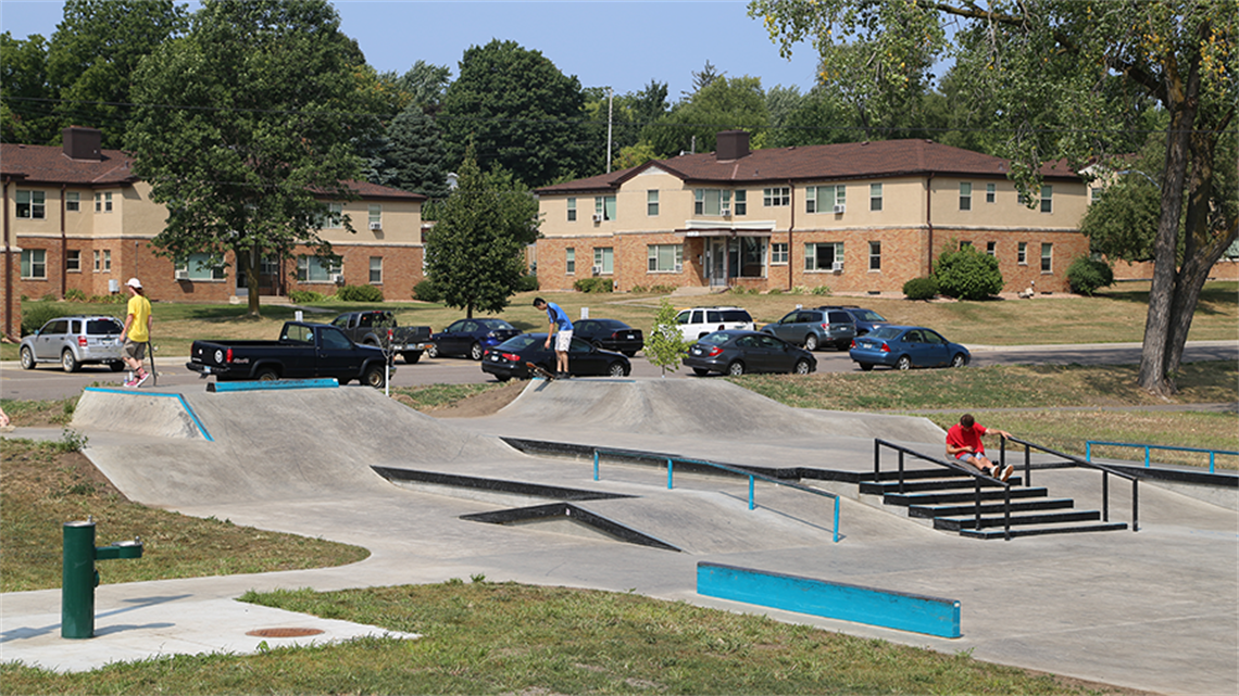 Kids skating at outdoor skate park at Carpenter Park